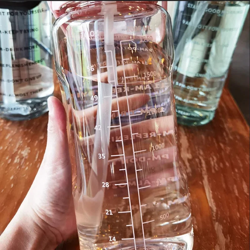 HydraMuse™: 2L Time-Marked Sports Bottle 💧🏋️‍♀️🌸